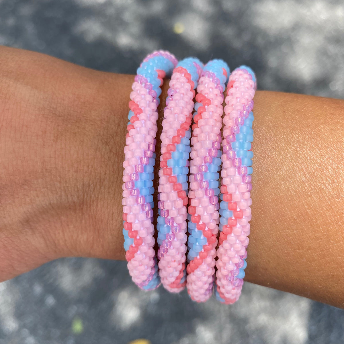 Handmade glass bead bracelet from Nepal, featuring a roll design. Also known as a beaded bracelet, seed bead bracelet, beach glass bracelet, or sea glass bracelet