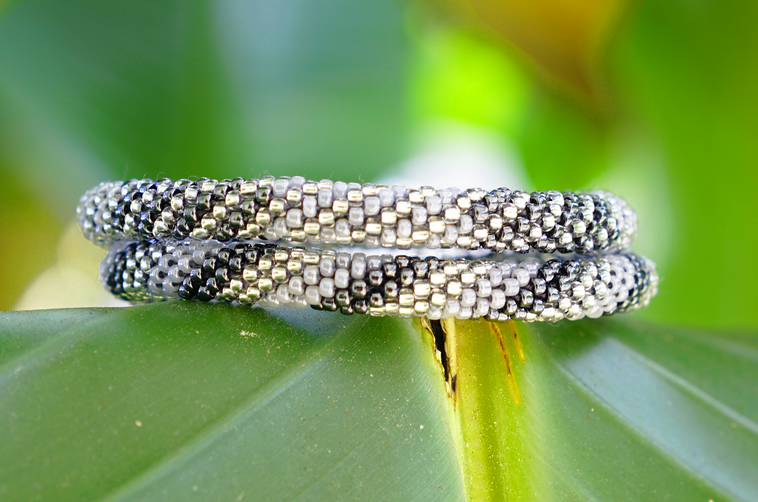 Handmade glass bead bracelet from Nepal, featuring a roll design. Also known as a beaded bracelet, seed bead bracelet, beach glass bracelet, or sea glass bracelet.