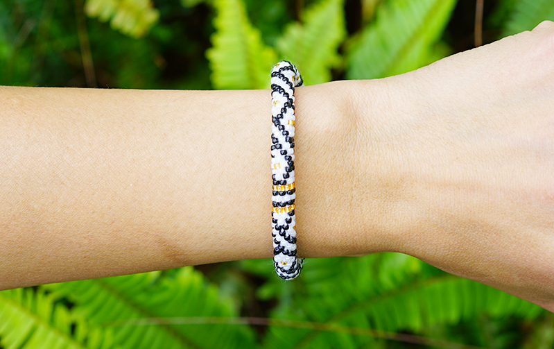 Handmade glass bead bracelet from Nepal, featuring a roll design. Also known as a beaded bracelet, seed bead bracelet, beach glass bracelet, or sea glass bracelet