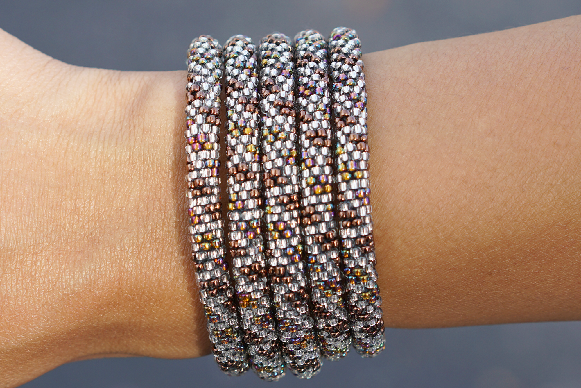 Handmade glass bead bracelet from Nepal, featuring a roll design. Also known as a beaded bracelet, seed bead bracelet, beach glass bracelet, or sea glass bracelet