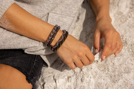 Handmade glass bead bracelet from Nepal, featuring a roll design. Also known as a beaded bracelet, seed bead bracelet, beach glass bracelet, or sea glass bracelet