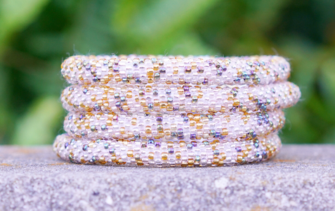 Handmade glass bead bracelet from Nepal, featuring a roll design. Also known as a beaded bracelet, seed bead bracelet, beach glass bracelet, or sea glass bracelet.