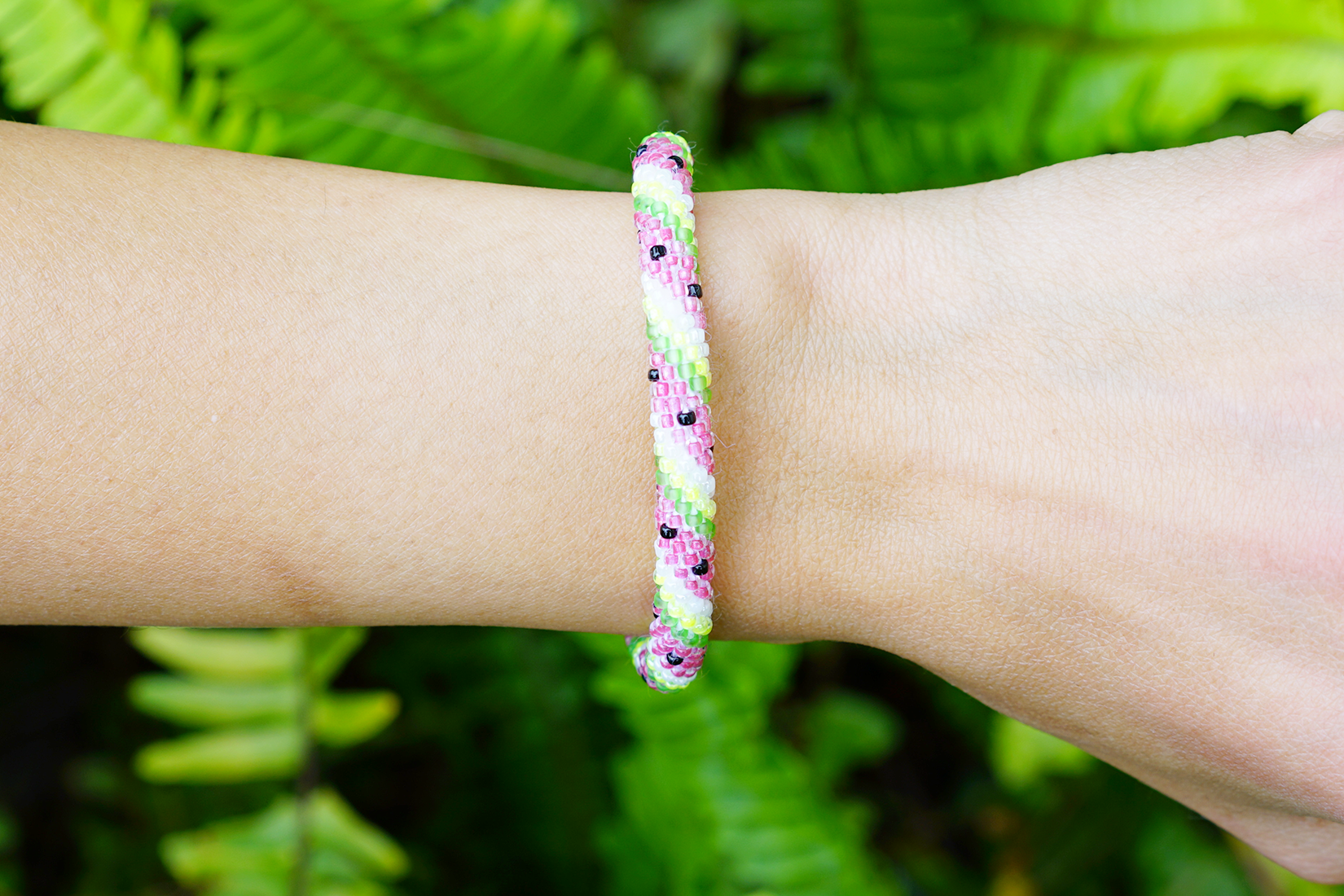 Handmade glass bead bracelet from Nepal, featuring a roll design. Also known as a beaded bracelet, seed bead bracelet, beach glass bracelet, or sea glass bracelet