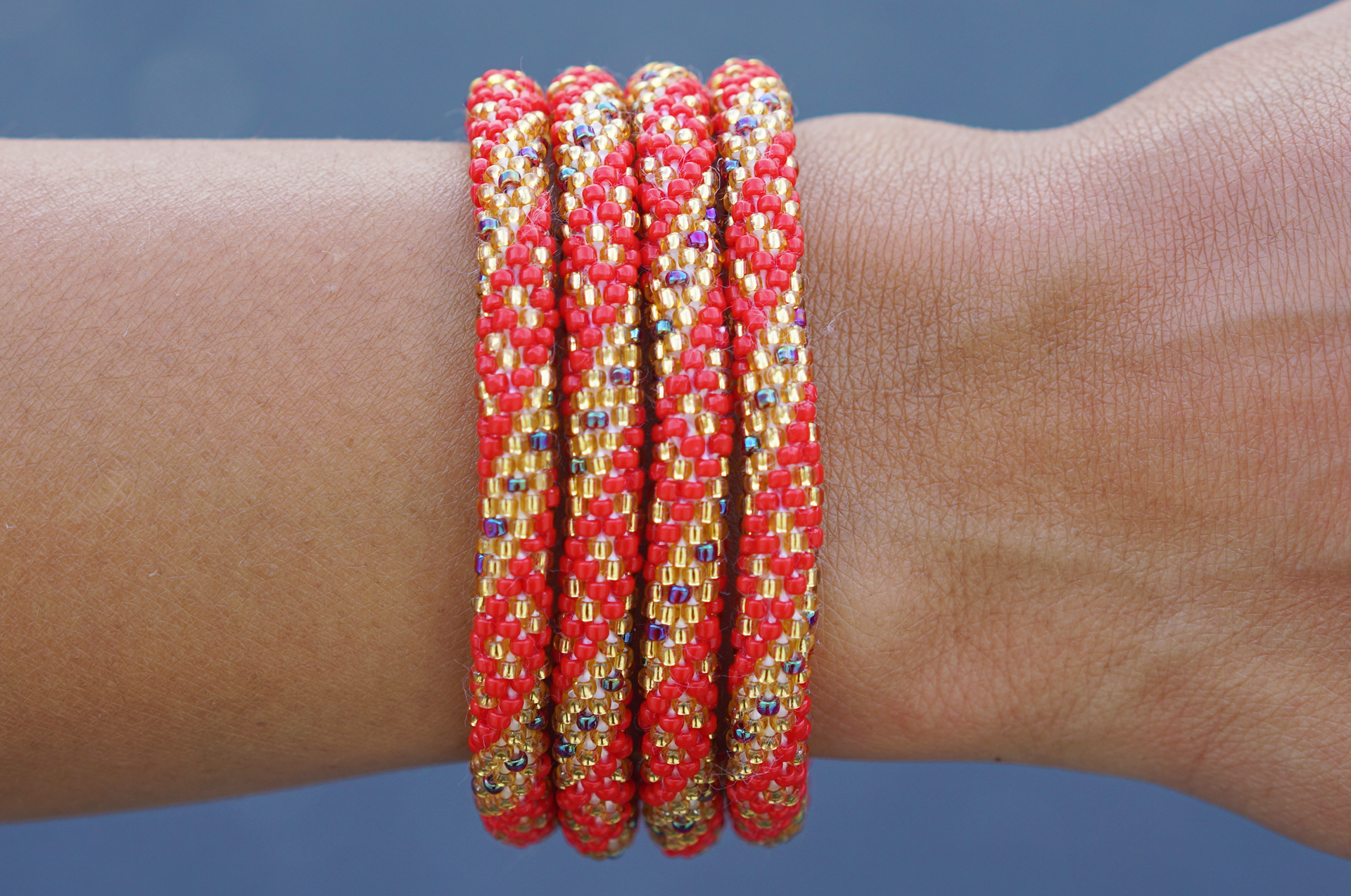 Handmade glass bead bracelet from Nepal, featuring a roll design. Also known as a beaded bracelet, seed bead bracelet, beach glass bracelet, or sea glass bracelet.