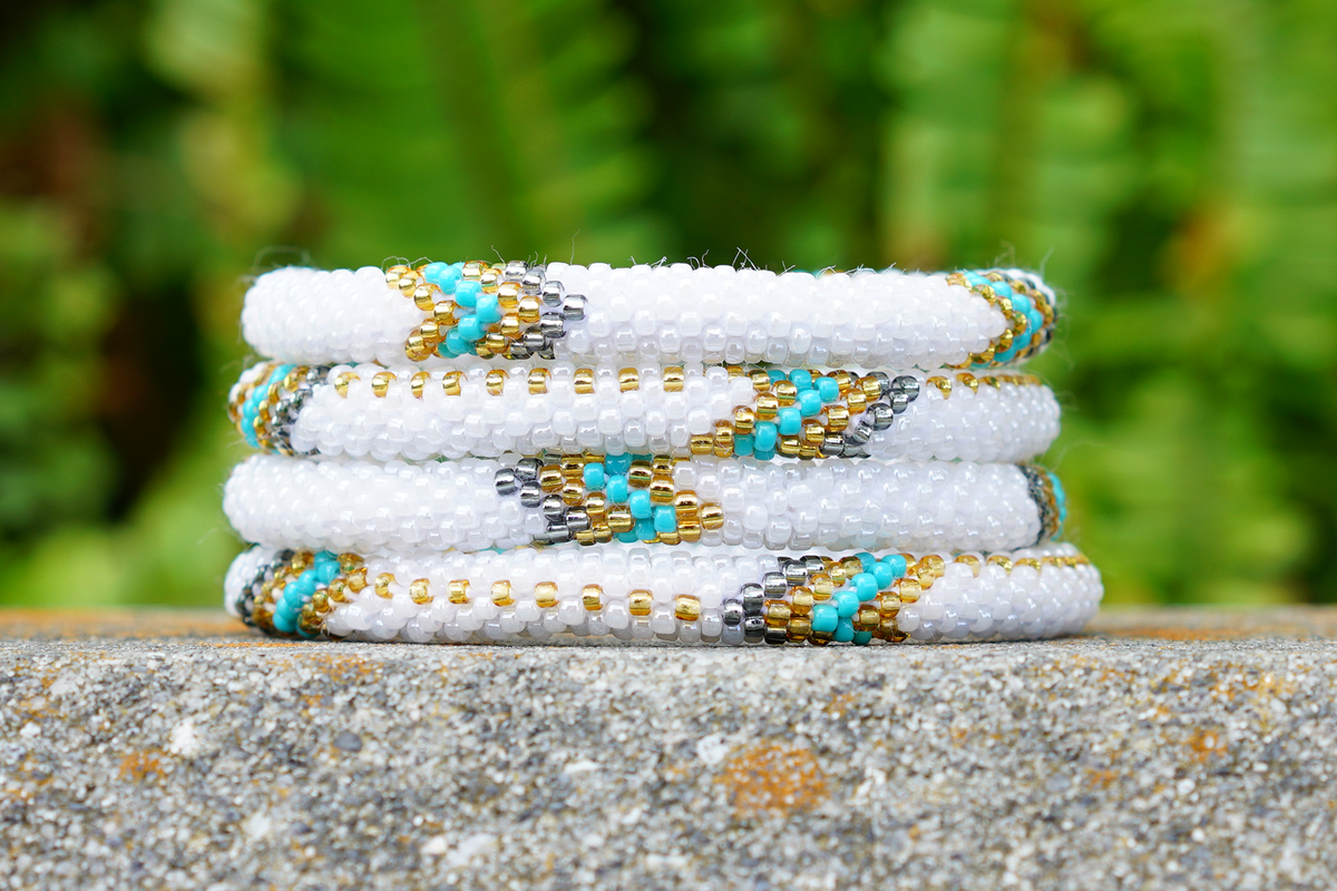 Handmade glass bead bracelet from Nepal, featuring a roll design. Also known as a beaded bracelet, seed bead bracelet, beach glass bracelet, or sea glass bracelet.