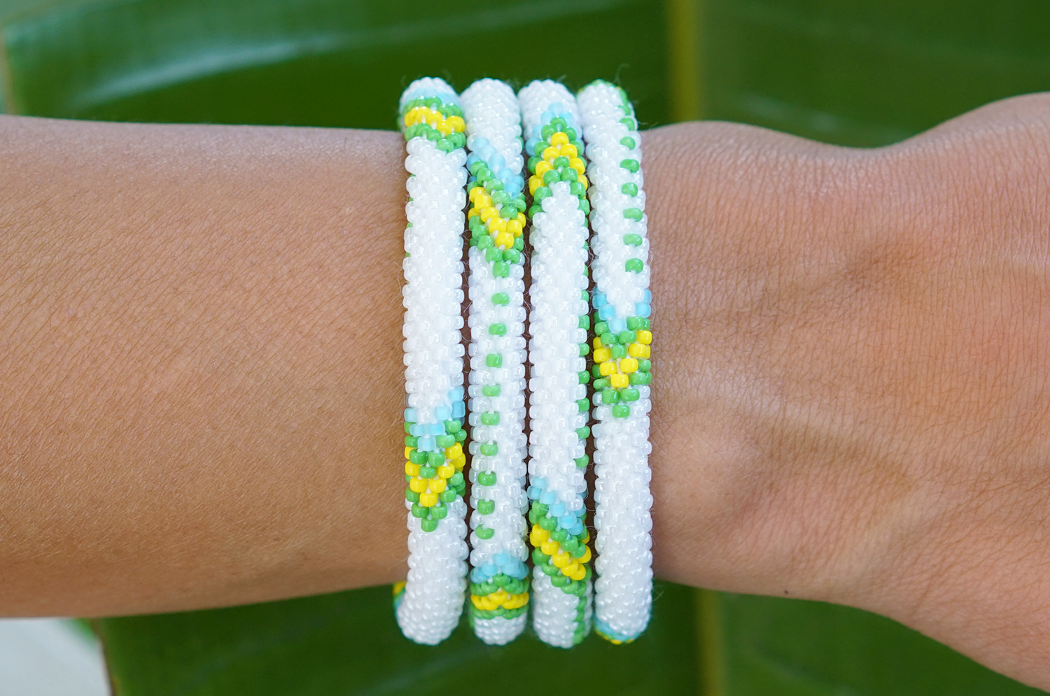 Handmade glass bead bracelet from Nepal, featuring a roll design. Also known as a beaded bracelet, seed bead bracelet, beach glass bracelet, or sea glass bracelet.