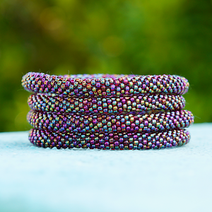 Handmade glass bead bracelet from Nepal, featuring a roll design. Also known as a beaded bracelet, seed bead bracelet, beach glass bracelet, or sea glass bracelet