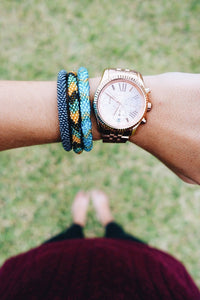 Handmade glass bead bracelet from Nepal, featuring a roll design. Also known as a beaded bracelet, seed bead bracelet, beach glass bracelet, or sea glass bracelet.